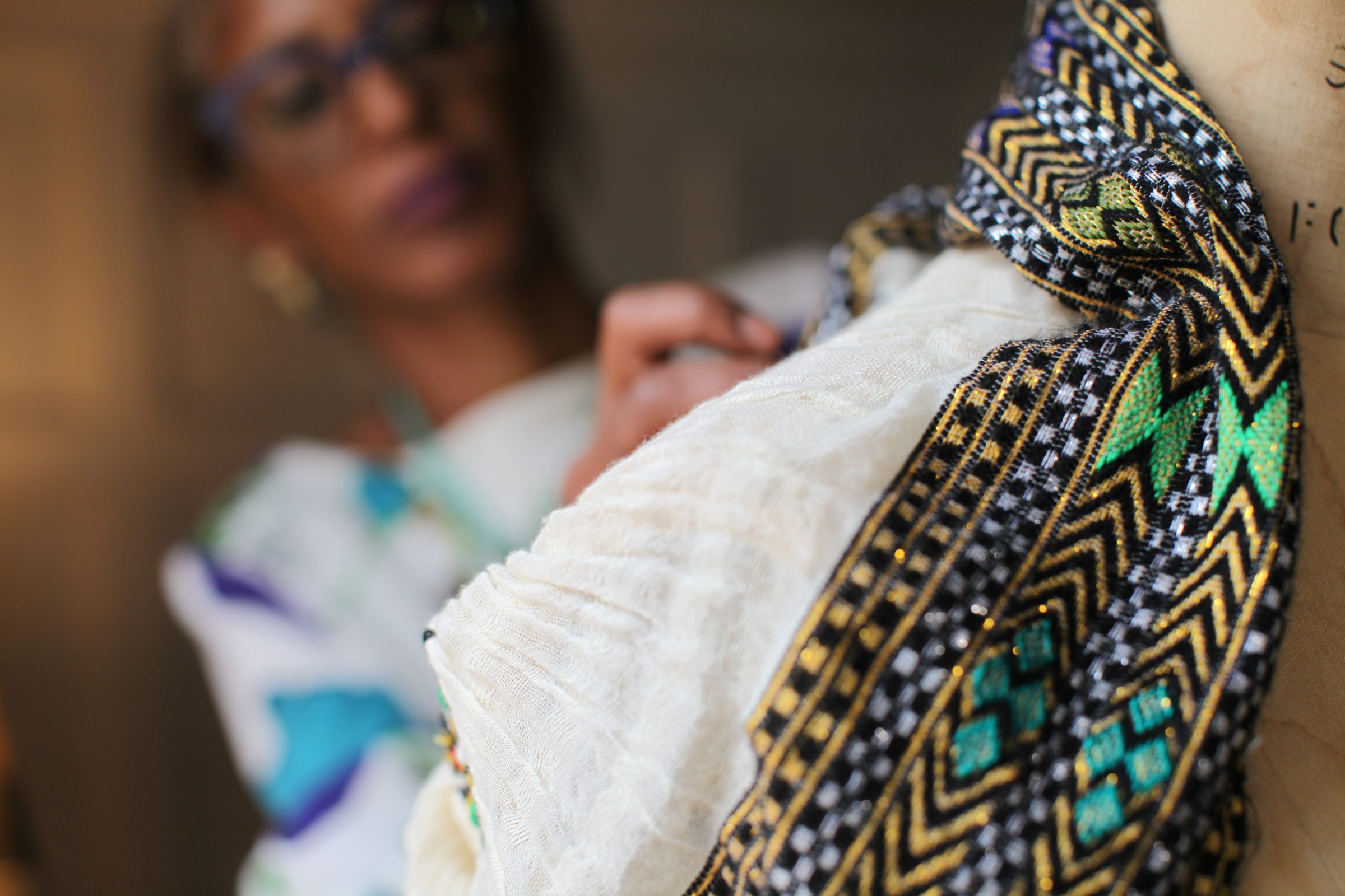 Handcrafted embroidery detail from an Adulis Gaim garment